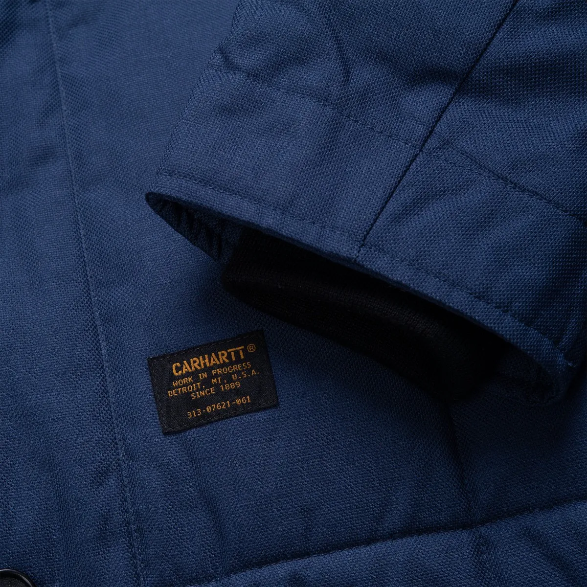 Carhartt WIP - Manteau bleu col mouton