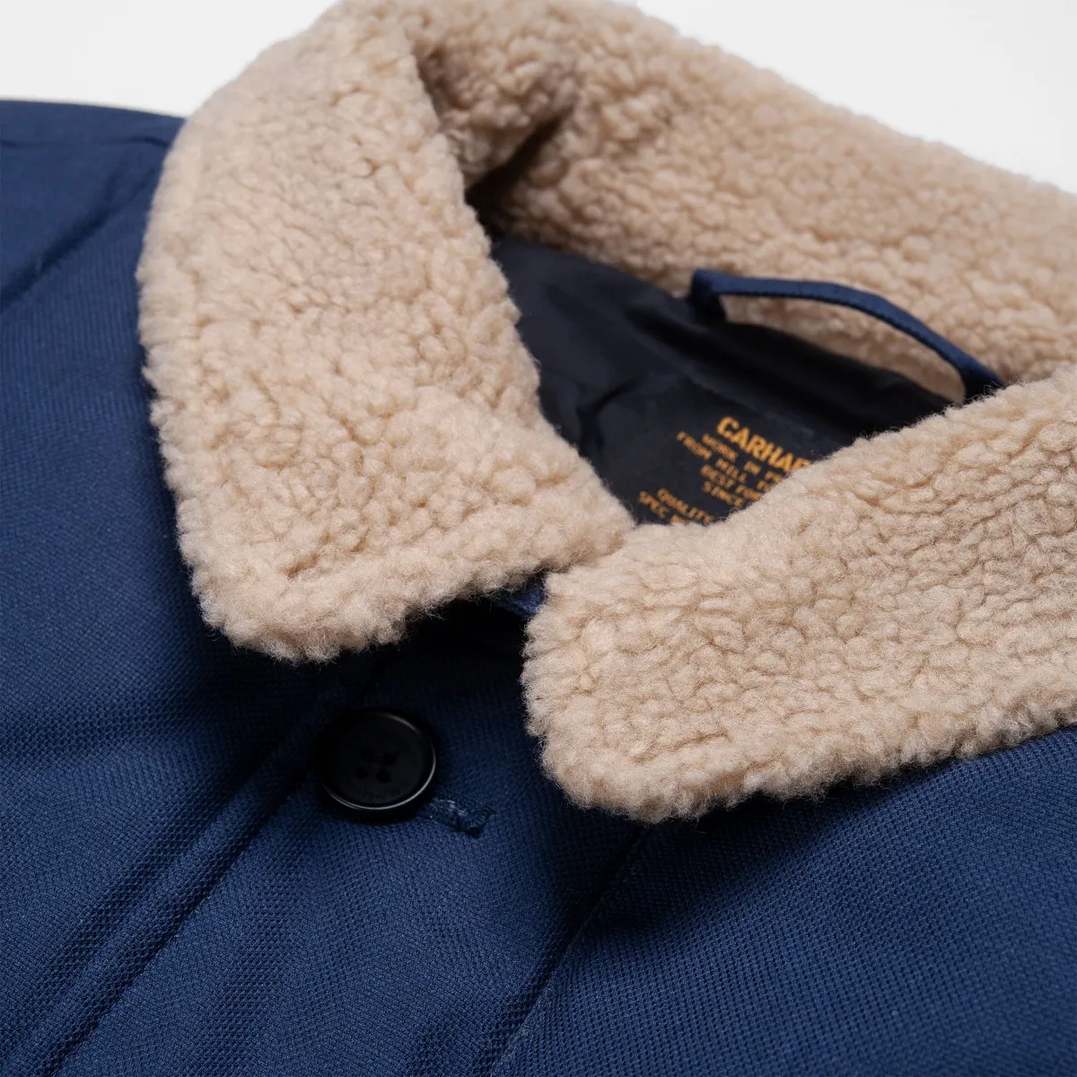 Carhartt WIP - Manteau bleu col mouton