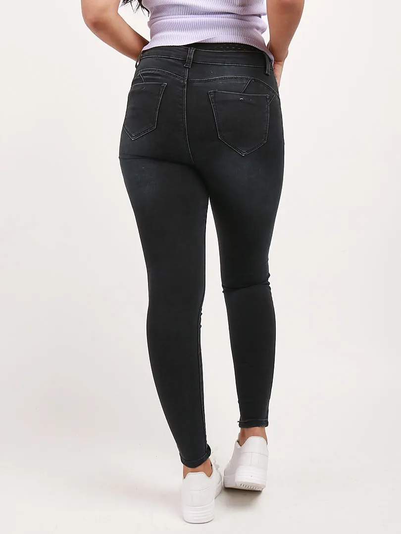 Jeans slim noir un bouton 5 poches