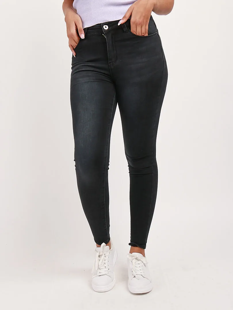 Jeans slim noir un bouton 5 poches